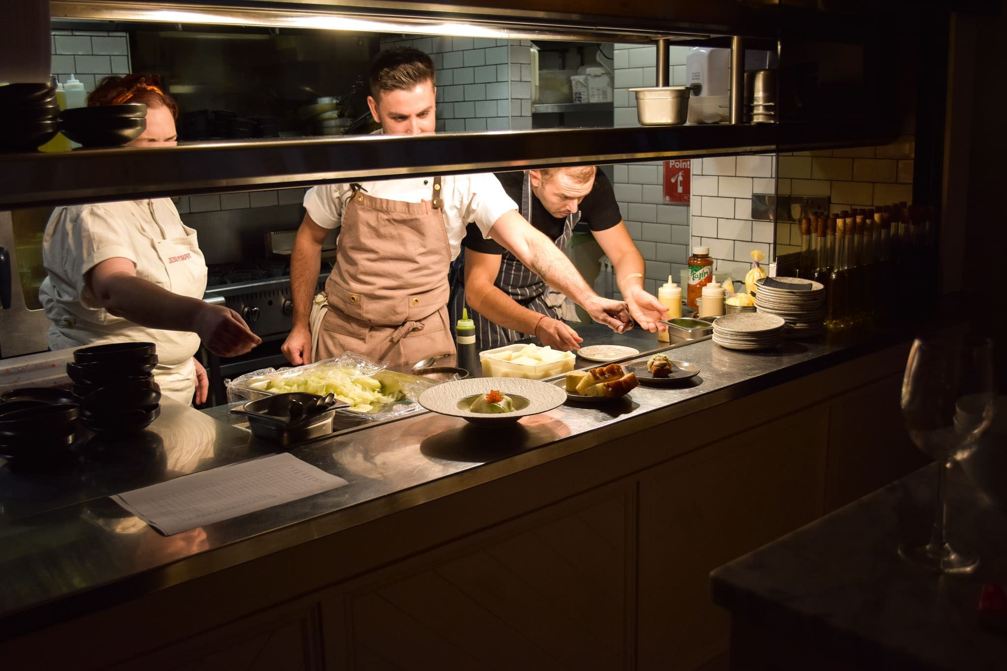 A photo showing Jess Murphy from Kai Restaurant and Harry Quinn from Pichet at the pass in Pichet.