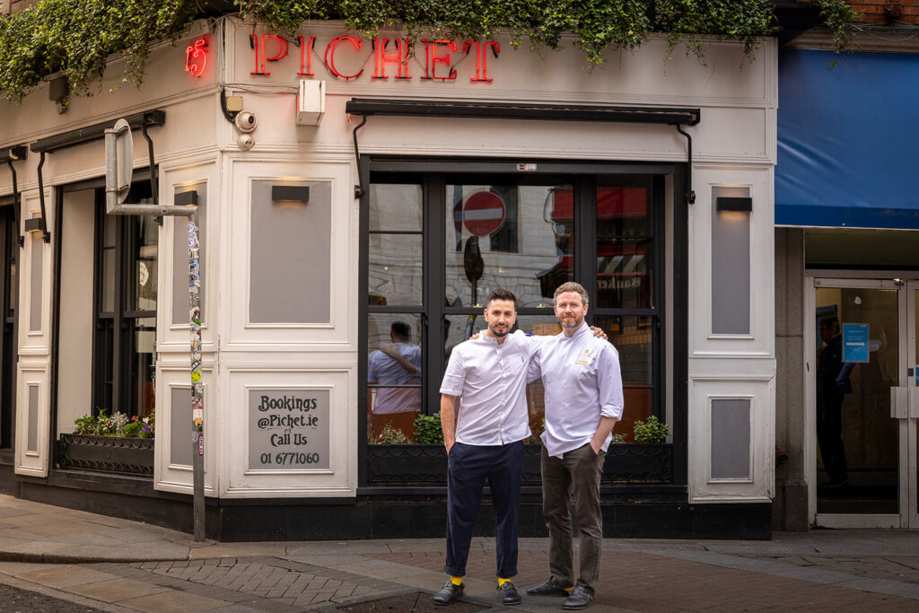 Chef Liam and Chef Harry outside Pichet restaurant