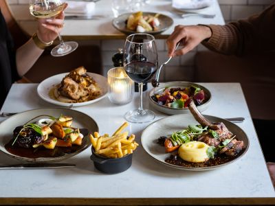 People are enjoying their meal with a glass of wine, Why Pichet is One of the Best Restaurants in Dublin