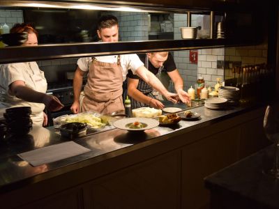 A photo showing Jess Murphy from Kai Restaurant and Harry Quinn from Pichet at the pass in Pichet.